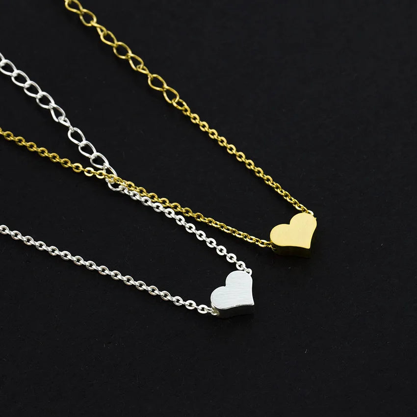 Trendiges Gliederarmband mit Mini-Herz-Motiv