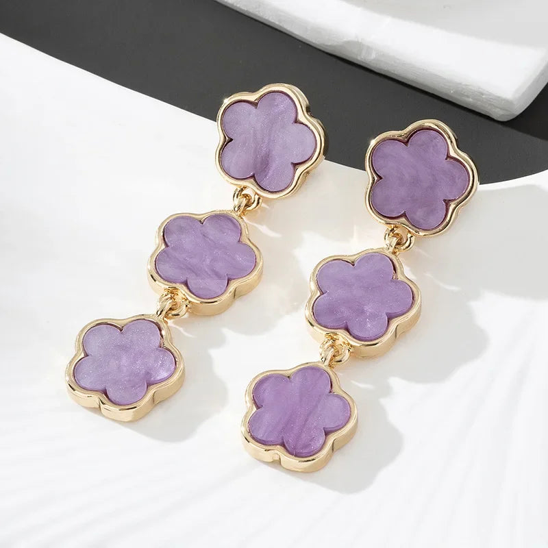 Charmante Ohrhänger mit Glücksmotiv (Fünfblättrige Blume)